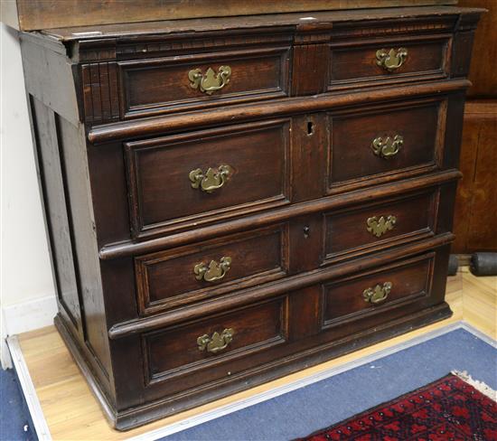 A William III oak geometric oak chest of drawers W.107cm